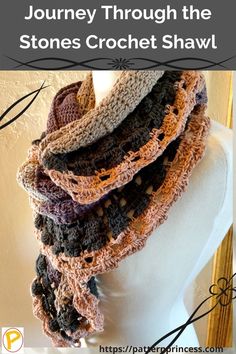 a crocheted scarf on top of a white mannequin with text overlay reading journey through the stones crochet shawl