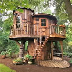 a tree house built into the side of a hill