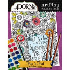 an adult coloring book with markers and pencils