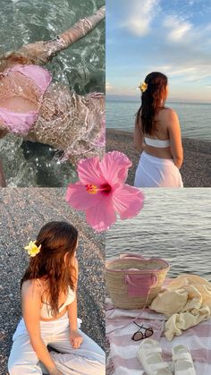 two women in bathing suits are sitting on the beach and one is holding a pink flower