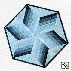 a blue and black quilted hexagonal design on a white background with the words,