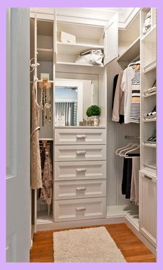 an organized closet with white drawers and shelves