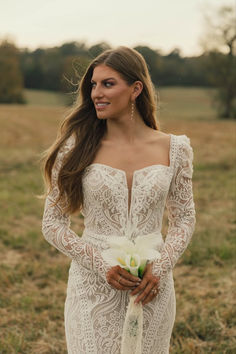 A corset-inspired laced back and high-contrast lace pair with delicate puff long sleeves, blending timeless elegance with modern romance. #CorsetBackDress #PuffSleeveDress #BridalStyle #WeddingDressInspo Wilderly Bride, Elegant Corset, Corset Back Dress, Long Sleeve Bridal Gown, Boho Shops, Corset Back, Puff Long Sleeves, Allure Bridal, Modern Romance