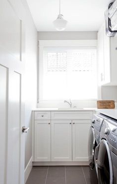 a washer and dryer in a small room