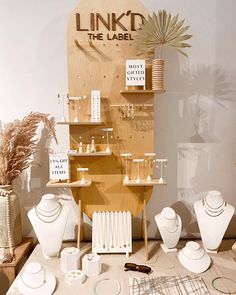 an assortment of jewelry on display in a store