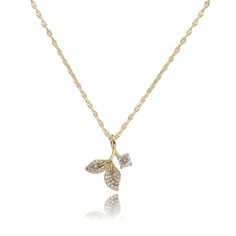 PRICES MAY VARY. Exquisite cute small leaf tail pendant necklace, a true symbol of elegance and sophistication. Crafted with attention to detail, this necklace features a delicate dainty crinkle link chain and a lovely young seedling pendant, adding a touch of charm and uniqueness. Enhancing its beauty and capturing attention, the chain features a highly sparkling cubic zirconia that effortlessly draw the eye. Adorned with pave rhinestone fish tail leaves, which evokes a delightful sense of warm Simple Pendant Necklace, Christmas Jewelry Gift, Simple Pendant, Pendant Necklace Simple, Fish Tail, Dangle Necklaces, Dainty Chain, Meaningful Jewelry, Small Leaf