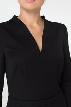 "A beautiful black dress featuring pencil silhouette, midi length and high neck collar. - Stand up collar with v-neck - Fitted pencil silhouette - Knee length (midi) - 3/4 sleeves - concealed back zipper closure Color: Black. Fiber: viscose 45%, elastane - 5%, polyester - 50% For Size S: dress length - 40\", sleeve length - 14,5\" (2/3) Our model wears size S (US 6) and is 171cm/5'6\" tall. You may feel free choosing the size. Just send us your measurements (bust, waist, hips, height). We will d Elegant V-neck Bodycon Dress For Formal Occasions, Chic V-neck Midi Dress For Business, Classic V-neck Mini Dress For Semi-formal Occasions, Chic Sheath V-neck Dress For Formal Occasions, Formal V-neck Midi Dress, Black Fitted V-neck Dress For Formal Occasions, Elegant Fitted V-neck Dress With Flattering Silhouette, Elegant Long Sleeve Bodycon V-neck Dress, Chic V-neck Bodycon Dress For Office