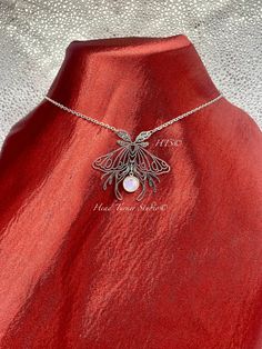 "☽ ༓･.Handmade Rainbow Moonstone Luna Moth Necklace in Silver.･༓☾ Moonstone Magic - The Stone of Love, Strength & Peace! This stunning necklace will make an enchanting statement!  Bold and beautiful!  Designed to Turn Heads! Choice of Adjustable Choker or Necklace Length ⋆☽ ༓･.･ ✨P R O D U C T I O N - T I M E ✨ Each pair of my lovingly handcrafted pieces are naturally one of a kind and hand made to order. Please allow 1-3 business days for production. If you have a specific deadline, please let me know and I will do my best to accommodate you! ✨N A T U R A L - V A R I A T I O N ✨ Please note, each piece is innately unique and your pair may vary slightly from the product photos, but will be just as beautiful!  ✨S P E C I A L  Q U A L I T I E S✨ MOONSTONE Stone of Love, Inner Strength and Pe Mystical Silver Choker Necklace, Moonstone Aesthetic, Luxury Mystical Moonstone Necklace, June Gemstone, Wedding Jewelry Silver, Lunar Moth Necklace, Moth Jewelry, Lunar Moth Earrings, Witchy Wedding