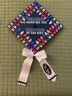 a graduation cap that says teaching is using all the gravons in the box