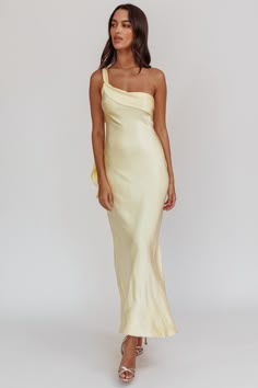 Carmel One-Shoulder Sash Maxi Dress Butter by Selfie Leslie Flowy Off The Shoulder Dress, Yellow One Shoulder Dress, Casual Summer Wedding Guest Dress, Soft Autumn Prom Dress, Pastel Yellow Long Dress, Long Dresses Spring, Bridesmaid Dresses Light Yellow, Pale Yellow Wedding Guest Dress, Pale Yellow Formal Dress