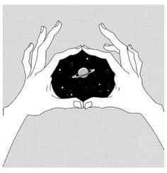 two hands are holding an object in the middle of their palms, with saturn above them