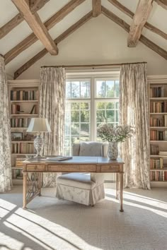 French country home office with exposed beams vaulted ceiling large windows linen curtains rustic desk antique lamp wildflowers French Country Home Office, Country Home Office, French Country Office, Cozy French Country Living Room, French Country Sofa, Country Sofas, French Country Colors, French Country Decorating Living Room