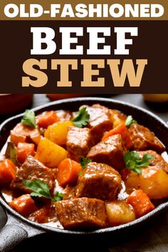 an old fashioned beef stew in a skillet with carrots and parsley