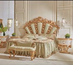 an ornately decorated bedroom with gold furniture