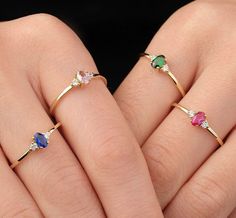 Our colorful stone ring is made of 14k real gold and it's available in four gemstone color options; sugar pink, powder pink, green, and blue. At the top, between round zircon stones, it has an oval cut colorful stone. Thanks to its minimalist and dainty style, it will be your everyday ring. If you consider our dainty ring as a gift for your loved ones, it will be an excellent choice. Especially, it makes happy your loved ones on their birthdays, mother's day, valentine's day, anniversaries, or g Pink Stone Rings, Ring Three Stone, Pink Powder, Dainty Style, Bridal Jewelry Collection, Zierlicher Ring, Everyday Ring, Gold Designs, Three Stone Ring