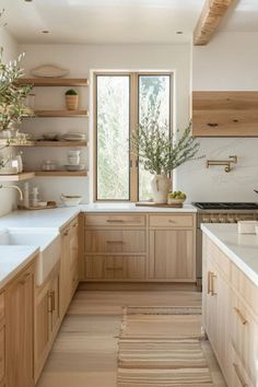 the kitchen is clean and ready for us to use it's natural wood accents