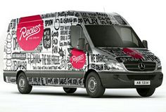 the mercedes benz van is covered in coca - cola's logo and advertisements for its brand