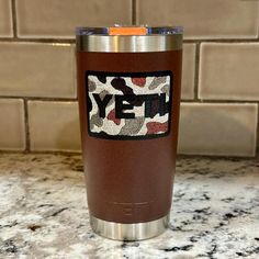 a yeti cup sitting on top of a counter