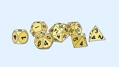 a group of yellow dices with numbers on them sitting in front of a blue background