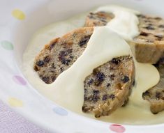 some food is sitting in a white bowl on a polka dot tablecloth and it looks like something out of nowhere