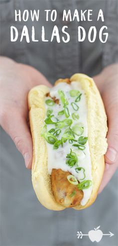 a person holding a hot dog with toppings on it and the title how to make a dallas dog