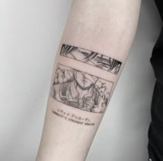 a person with a tattoo on their arm that has an image of anime characters in it