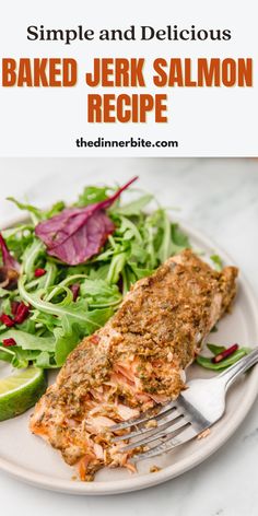 a white plate topped with salmon and salad