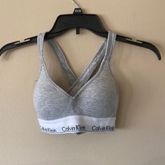 Great Condition Never Worn Fitted Calvin Klein Athleisure Tops, Casual Cotton Bra For Loungewear, Casual Medium Support Bra For Loungewear, Casual Bra With Medium Support For Loungewear, Calvin Klein Fitted Sports Bra For Athleisure, Calvin Klein Fitted Athleisure Sports Bra, Calvin Klein Fitted Sports Bra, Calvin Klein Sporty Activewear With Medium Support, Calvin Klein Stretch Activewear For Yoga