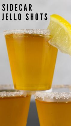 two glasses filled with lemonade sit next to each other