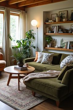 a living room filled with furniture and a potted plant