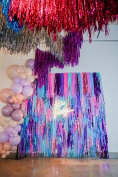 Make your event sparkle with fringe tinsel aerials in bright pink, purple, and turquoise! This colorful, glam setup is perfect for a mom’s wild night or sweet 16 bash. Ideal for planners and hosts wanting a fun, bold look. Discover decor ideas to add flair and excitement to your party atmosphere! Red Solo Cup