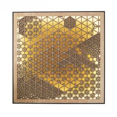 an intricately designed piece of art with yellow and brown colors