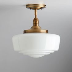 a light fixture hanging from the ceiling in a room