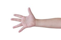 a person's arm and hand are shown with their fingers spread out to the side