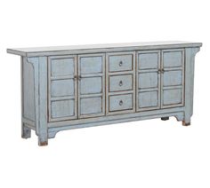 an old blue cabinet with many drawers