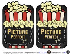 two black and white signs with popcorn on them, one says thanks for a picture perfect year