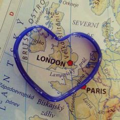 a heart shaped object sitting on top of a map with the word london in it