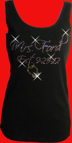 a women's black tank top with the words happy new year on it