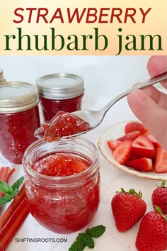 strawberry rhubarb jam in a mason jar with strawberries on the side