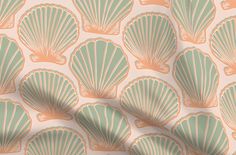 a wallpaper with seashells on it in pastel green and peach colors