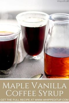 maple vanilla coffee syrup in glass containers with spoons on the table next to it