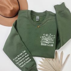 book sweatshirt book lovers, book sweatshirts, floral shirt, wildflower shirt, skeleton sweatshirt, skeleton with book and flowers, reading tee, librarian t-shirt, book t-shirt, bookworm t shirt, reading sweatshirt, funny reading shirt, Gift For Bookworms, gift for book lover. Stay cozy and stylish this season with our Bookholic sweatshirt! Designed for book lovers, this sweatshirt features a cute illustration of a skeleton holding a book and surrounded by flowers. The bold statement "Just A Girl Who Loves Reading Books" adds a touch of humor, making this sweatshirt a must-have for any bookworm. Made from soft and comfortable material, this sweatshirt is perfect for chilly days spent curled up with a good book. Its unique design makes it a great choice for a gift for a fellow book lover, t Bookworm Gift Ideas, Book Sweatshirts, Book Lover Gift Ideas, Custom Bookshelf, Reading Sweatshirt, Book Nerd Shirts, Book Tag, Skeleton Sweatshirt, Wildflower Shirt