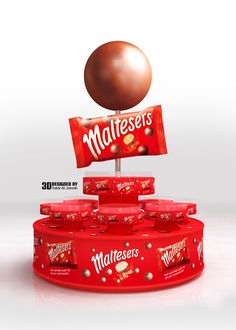 a chocolate candy bar on top of a red stand with an egg in the middle