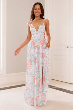 Length from shoulder to hem of size S: 146cm. Chest: 35cm. Waist: 33cm. across front only of size S. Maxi dress. Semi-lined. Model is a standard XS and is wearing size XS. True to size. Non-stretch. Elastic bodice/back. Inseam pockets. Tie-up shoulder straps. Slip on.  Cold hand wash only. Print placement may vary. Main: Polyester Lining: Polyester/Spandex. Please Note: This product is a hayhty Exclusive.    Blossom with confidence in the hayhty Beauty In All Maxi Dress. Featuring an elastic bodice and back with a gorgeous flowy skirt. Style with heels for compliments. First Day Outfit, Dress Peach, Bridal Shower Dress, Jumpsuits And Romper, Maxi Dress Wedding, Skirt Style, Long Sleeve Lace Dress, Print Placement, Flowy Skirt