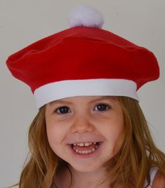 Christmas Hat Red and White Festive French Beret with Pompom Celebrate the Holidays or anytime. For both boys and girls. Babies, Toddlers, Children This hat is made from a soft fleece. The band is stretchy for a comfortable fit. This hat is available in the following sizes: X Small-Newborn-3mo.(15 inches circumference) Small-4-24 mo. (16 1/2 in.) Medium-2T-3T (18 - 19 in.) and Large- 4-9 Years (20 - 21 in.) It is easier to fit the hat to the child if you measure the child's head where the hat is Kids Fleece Hats, Christmas Beanie, Fleece Patterns, French Beret, Kids Beanies, Kids Fleece, Fleece Hat, Outer Wear, Baby Hat