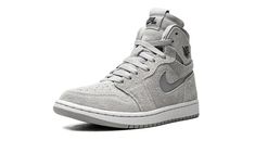 The Women’s Air Jordan 1 High Zoom CMFT “Grey Fog” is a monochromatic grey colorway of the modernized version of the retro basketball shoe.  Introduced by Jordan Brand in 2020, the Jordan 1 High Zoom Comfort is an example of Jordan Brand’s efforts to expand on the look and performance of the iconic high-top sneaker.  The design is complete with even more padding around the ankle collar, and it also features different materials for a fresh new vibe.  The “Grey Fog” has a monochromatic grey suede Retro Basketball Shoes, Hightop Sneakers, Womens Air Jordans, Air Jordan Sneakers, Black Wings, Nike Air Jordan 1, Air Jordan 1 High, Jordan 1 High, Grey Suede