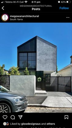 a car is parked in front of a house