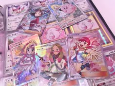 the pokemon trading cards are on display