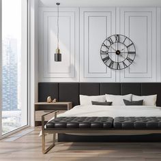 a large bed sitting in a bedroom next to a tall clock mounted on the wall