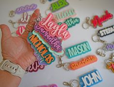 Decorate your bag or child's backpack with these fun personalized name tag keychains!  Choose your own color and font from the charts in the listing photos and make it your own!  These make great back to school items, gifts for teachers, party favors, or a "just because" gift! Glitter Stars style can be found here: https://www.etsy.com/listing/1680950008 Confetti Glitter Styles can be found here: https://www.etsy.com/listing/1499618022 Bulk orders for sports/dance/cheerleading teams and party fa Back To School Items, Name Keychains, Charm Party, Laser Cut Acrylic, Just Because Gifts, Glitter Stars, Gifts For Teachers, Bag Tag, Purse Charms